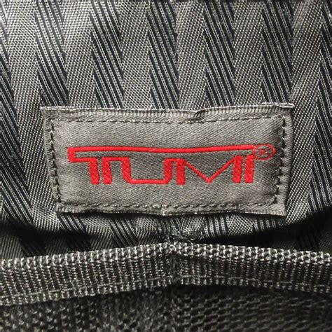 how to tell a tumi bag